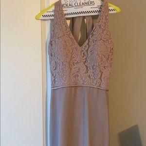Long formal tan/taupe dress with back details and Lacy train.